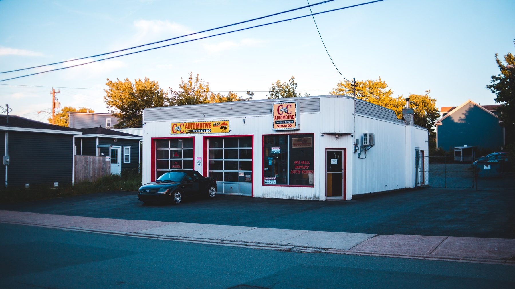 A small auto repair shop seen from the street